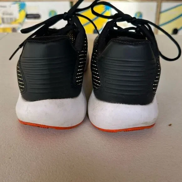 Under ArmourBlack and Orange Shoes